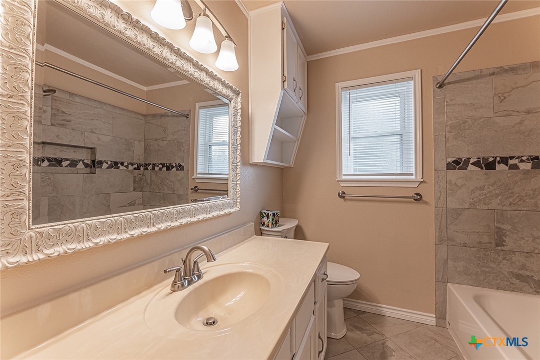 1102 End O Trail Harker Heights, TX 76548 - Photo 21 of 38 a bathroom with a sink toilet and shower