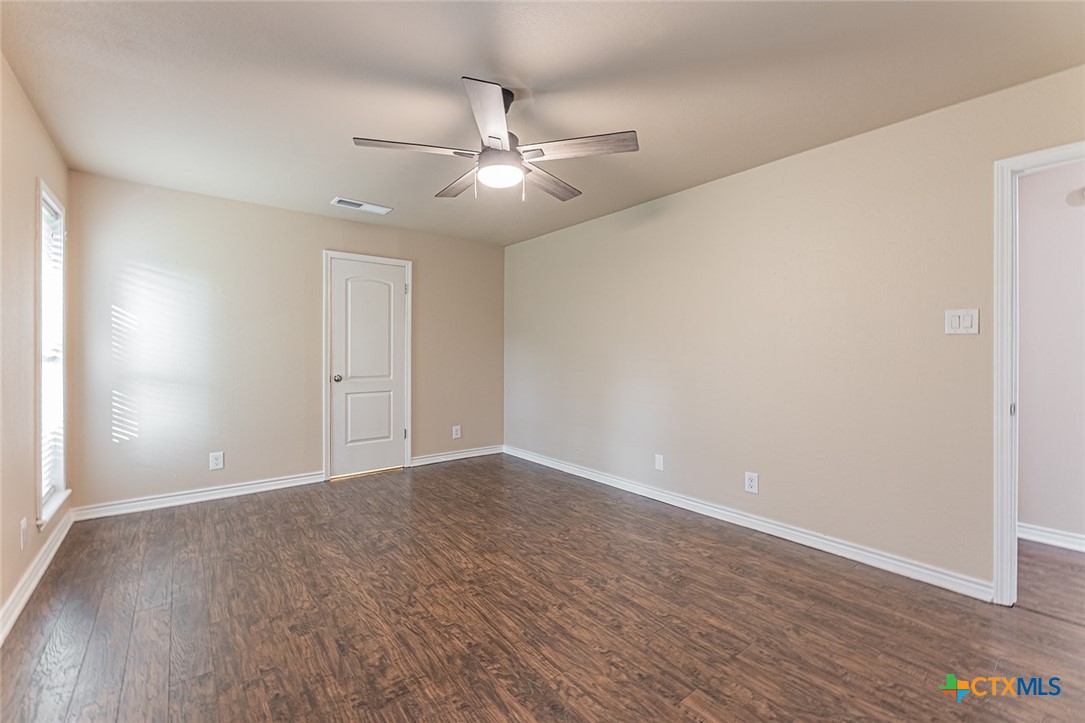 1102 End O Trail Harker Heights, TX 76548 - Photo 24 of 38 a view of an empty room with wooden floor
