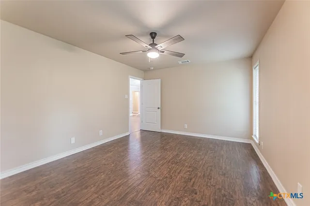 a bathroom with a sink a vanity and a mirror
