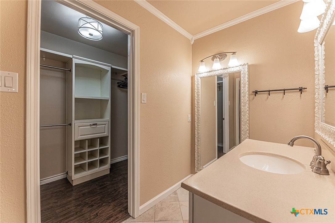 1102 End O Trail Harker Heights, TX 76548 - Photo 27 of 38 a bathroom with a sink a vanity and a mirror