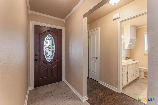 a view of a hallway with elevator