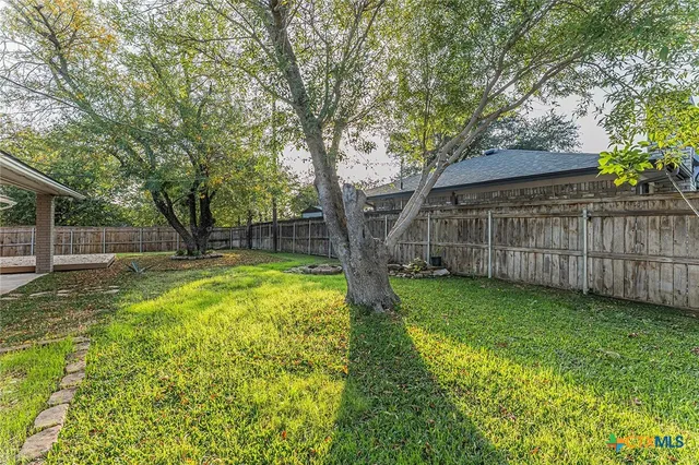 a house view with a outdoor space
