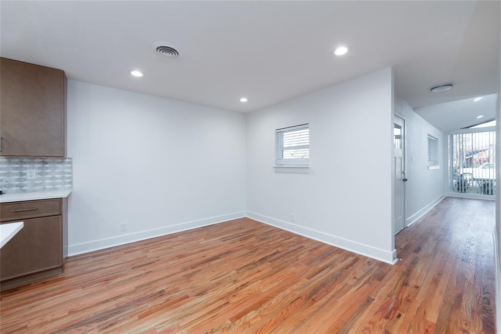 1241 Stevens Ridge Drive Dallas, TX 75211 - Photo 8 of 18 a view of empty room with wooden floor