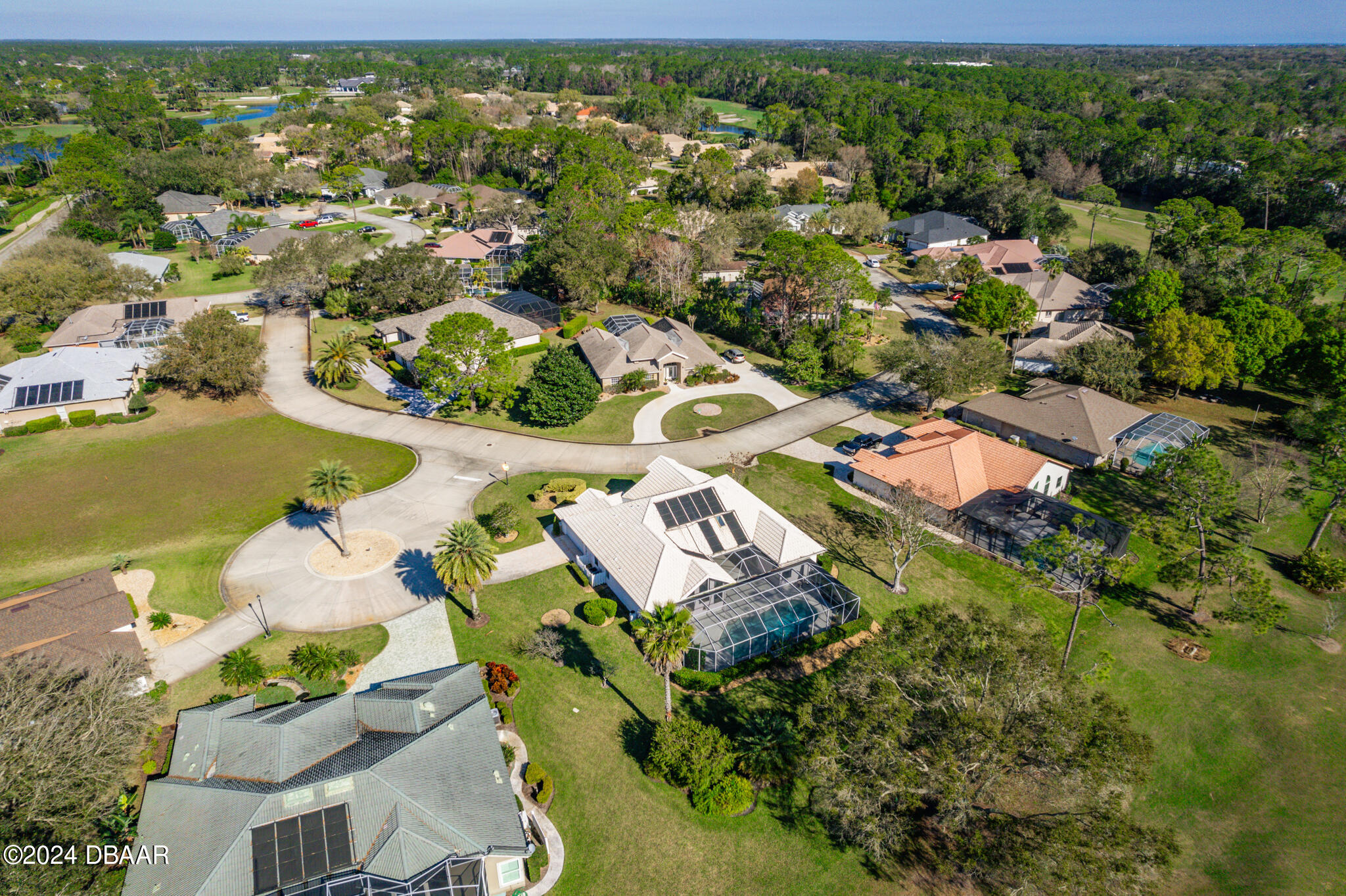 710 Dolphin Head Lane Ormond Beach, FL 32174 - Photo 33 of 42 an aerial view of residential houses with outdoor space and trees