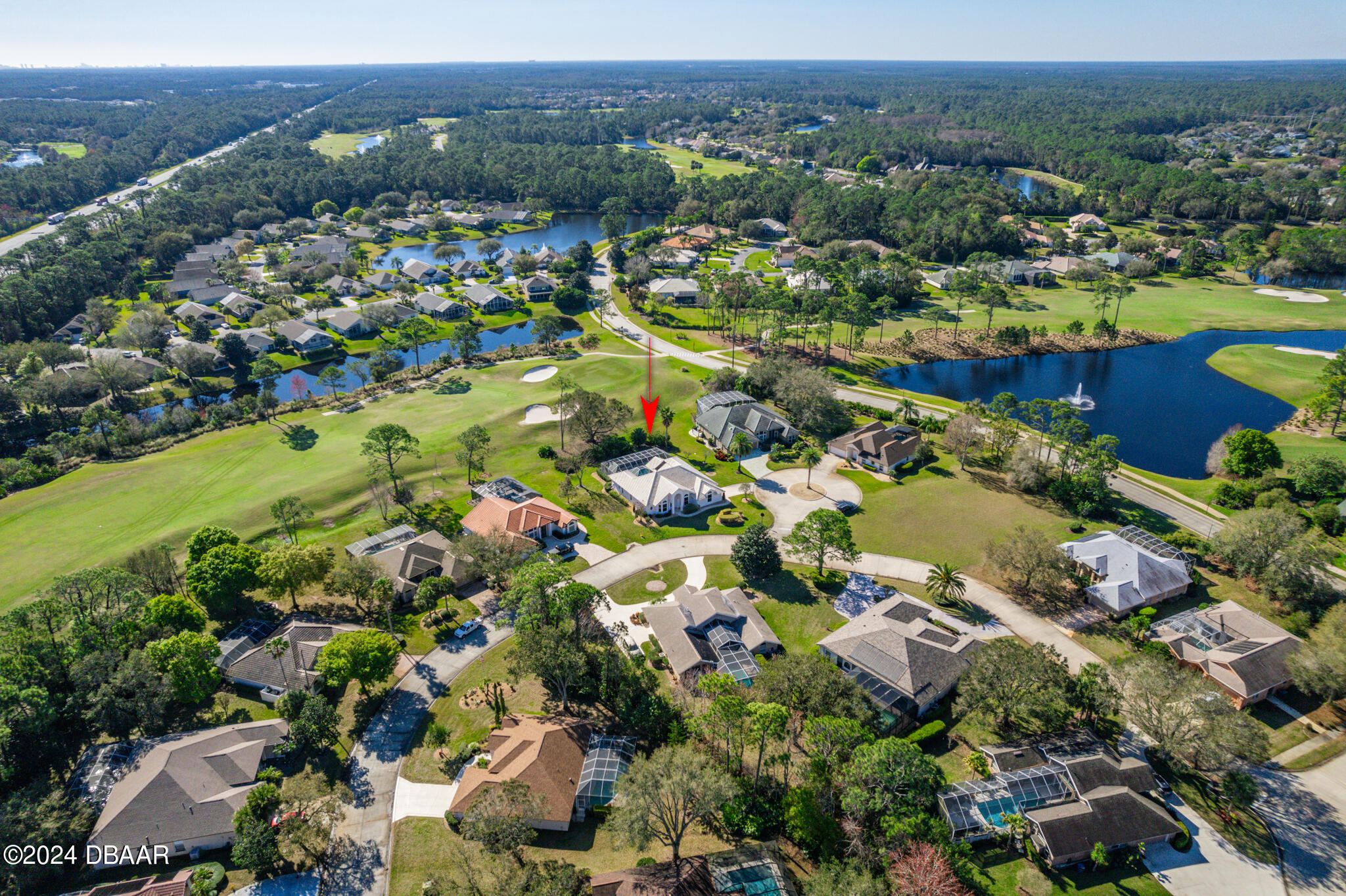 710 Dolphin Head Lane Ormond Beach, FL 32174 - Photo 34 of 42 an aerial view of residential houses with outdoor space and river