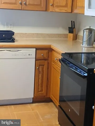 a view of a storage and utility room with a window