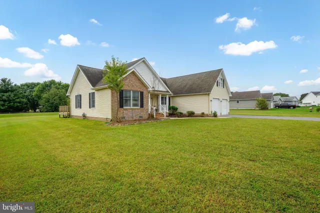 a view of a house with a big yard
