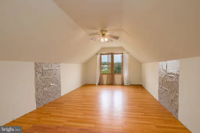 a big house with a big yard and large trees