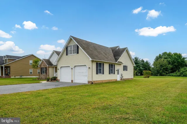 a view of a deck with sunset view