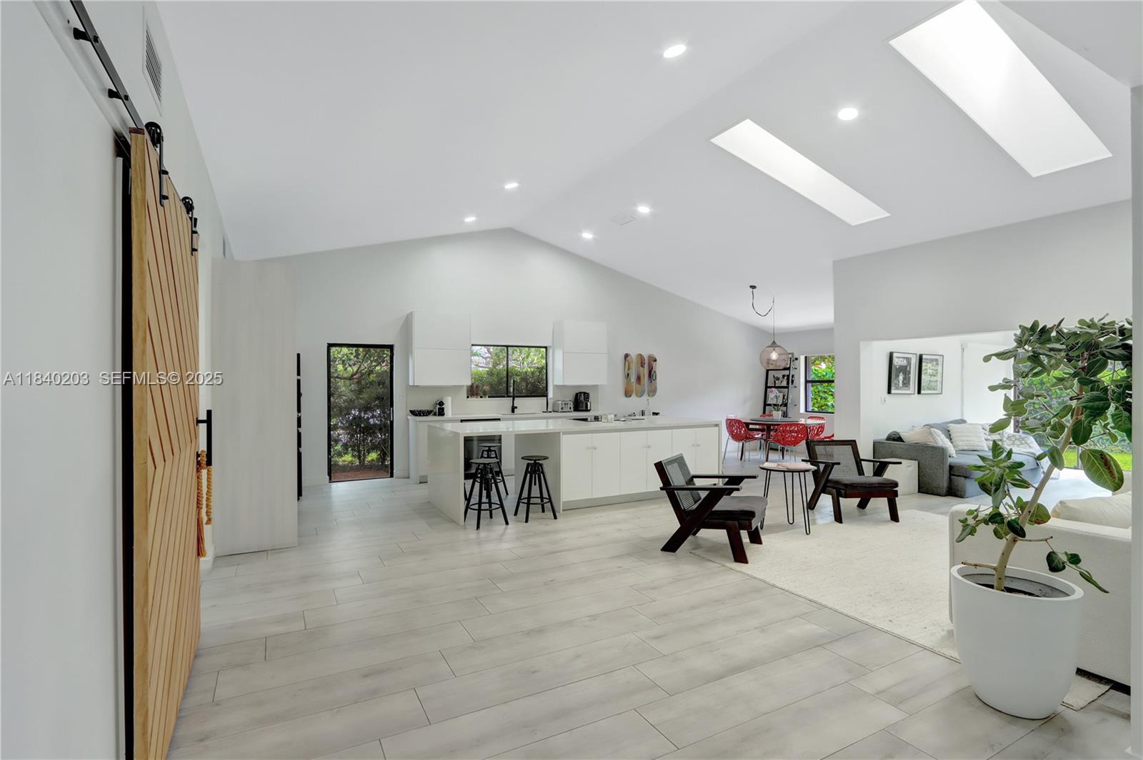 a view of a dining area with furniture and a livingroom