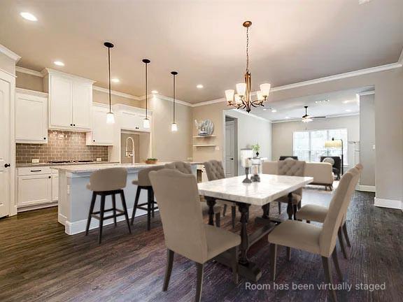 336 Kaye Street Coppell, TX 75019 - Photo 15 of 26 a large kitchen with a table and chairs