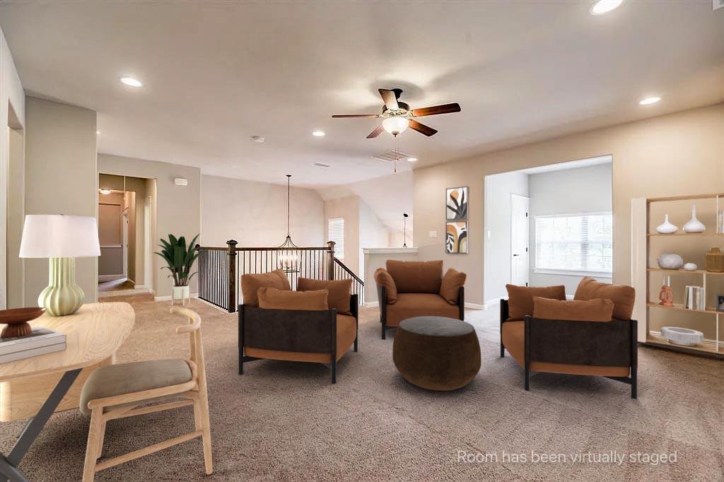336 Kaye Street Coppell, TX 75019 - Photo 17 of 26 a living room with furniture a ceiling fan a lamp and a large window