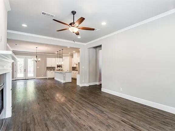 336 Kaye Street Coppell, TX 75019 - Photo 18 of 26 a view of empty room with wooden floor and window