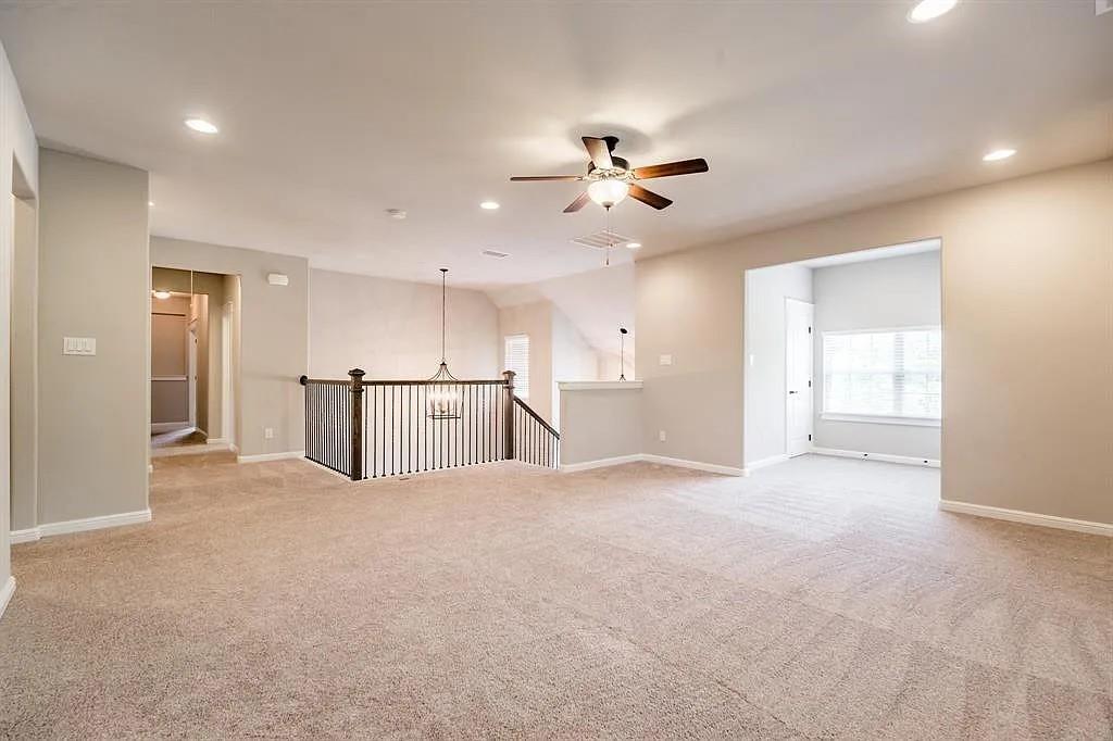 336 Kaye Street Coppell, TX 75019 - Photo 19 of 26 a view of a kitchen with a sink and a refrigerator