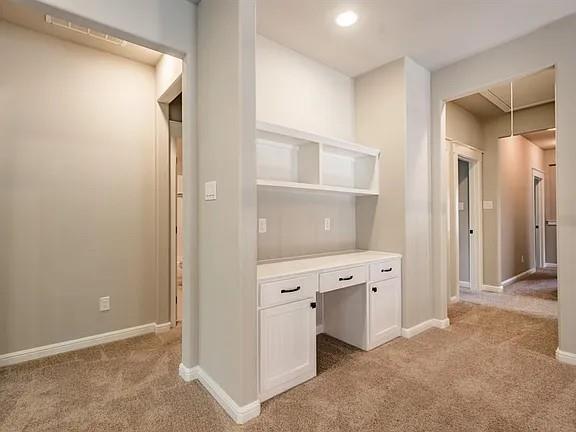 336 Kaye Street Coppell, TX 75019 - Photo 22 of 26 a view of cabinets with white walls