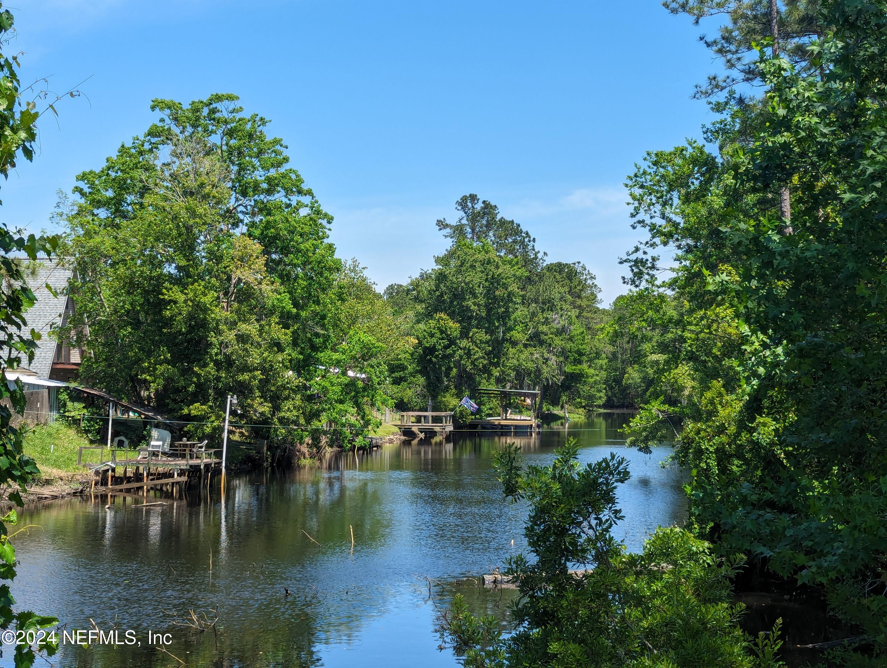 116 Islander Road Satsuma, FL 32189 - Photo 15 of 22 a view of lake with green space