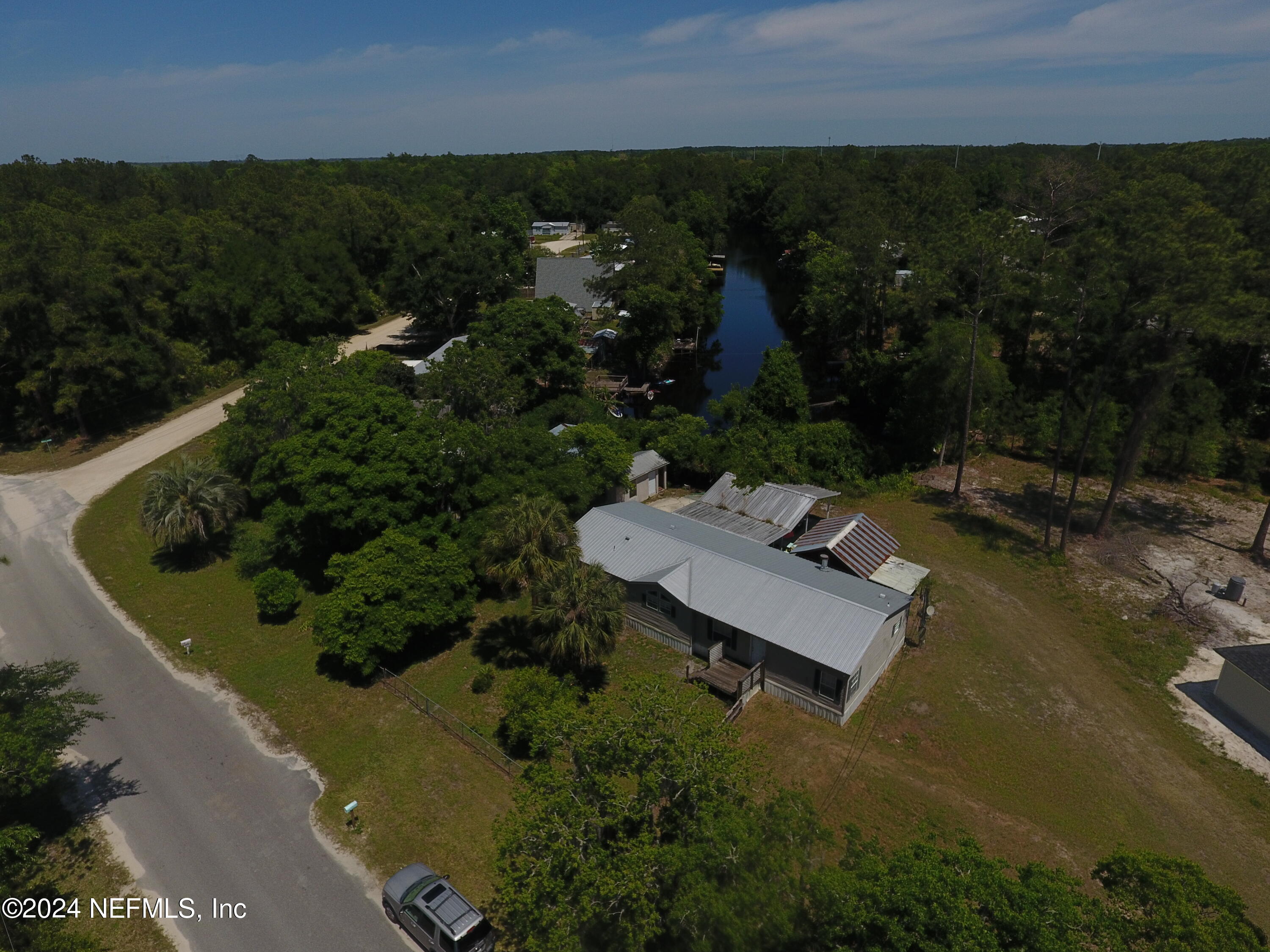 116 Islander Road Satsuma, FL 32189 - Photo 21 of 22 an aerial view of a house with a yard