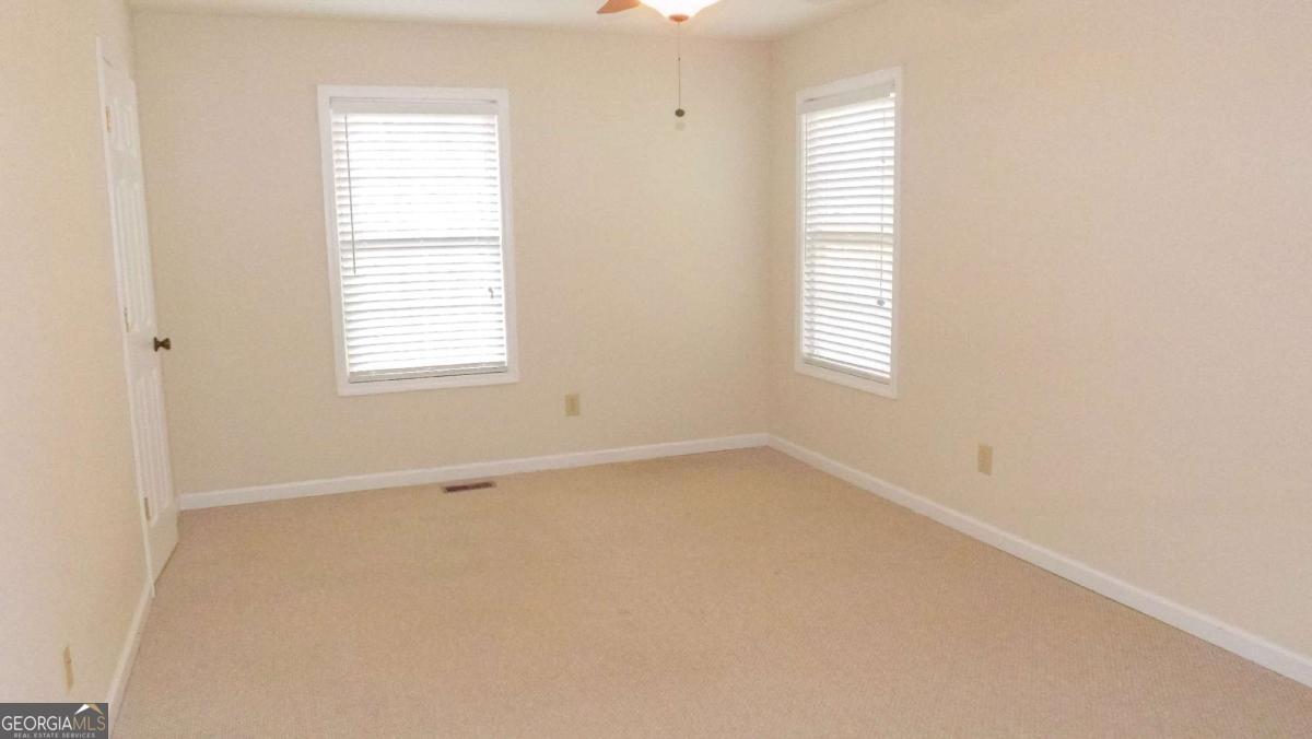 103 K D Lane Ellijay, GA 30540 - Photo 6 of 21 an empty room with a window