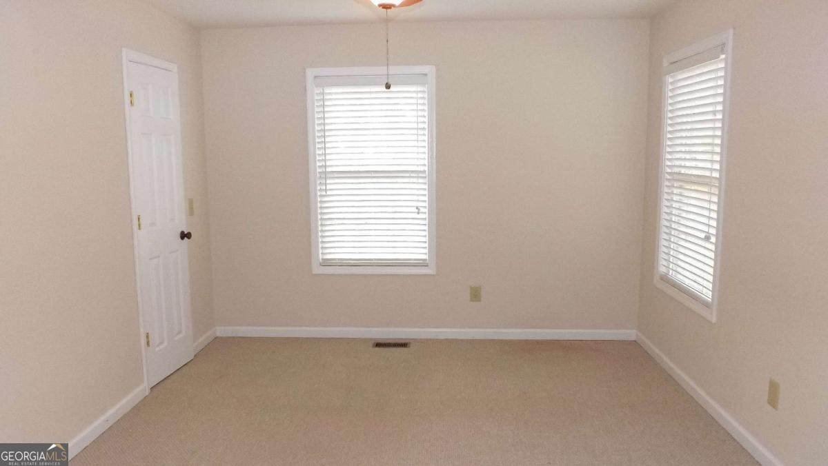 103 K D Lane Ellijay, GA 30540 - Photo 7 of 21 an empty room with a window
