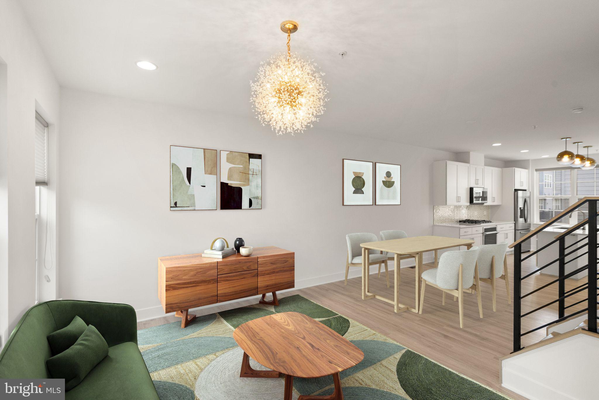 1862 Michael Faraday Drive Reston, VA 20190 - Photo 7 of 35 a living room with furniture a window and a chandelier