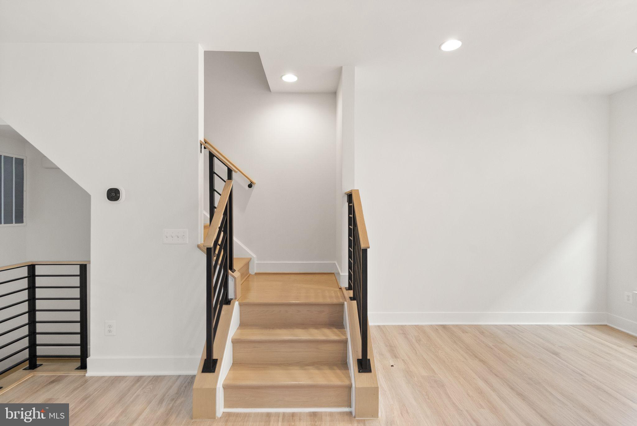 1862 Michael Faraday Drive Reston, VA 20190 - Photo 9 of 35 a view of entryway with wooden floor