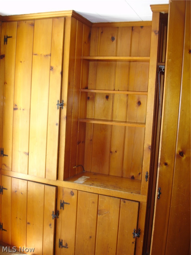 77 South Maple State Road Orwell, OH 44076 - Photo 10 of 30 Wooden built ins in 2nd bedroom, main floor.
