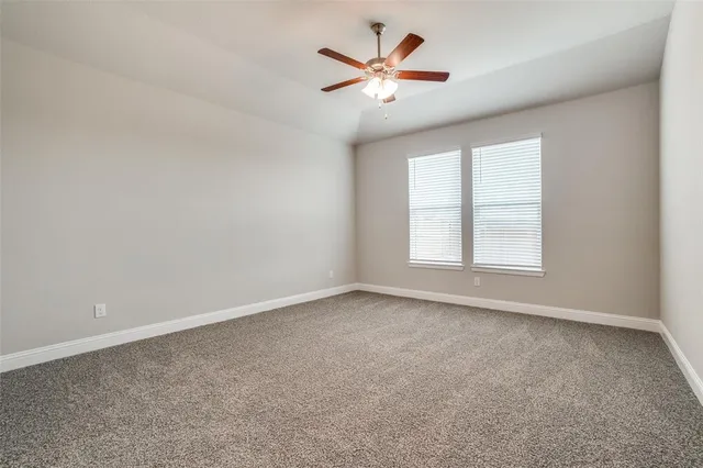a bathroom with a bathtub toilet and a shower