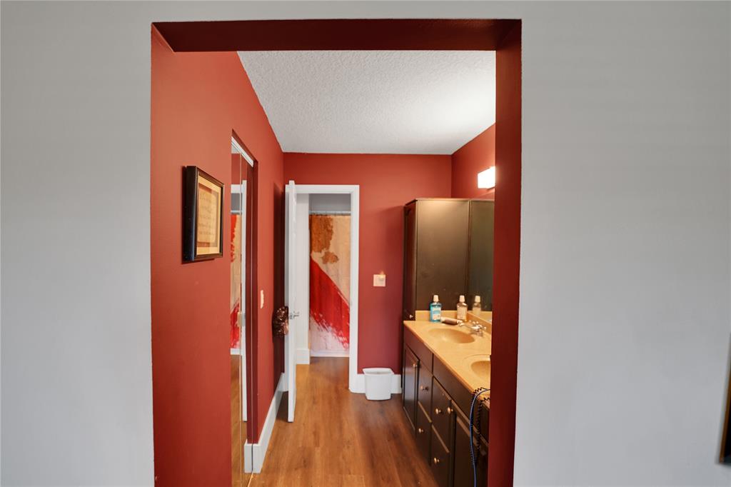 10700 Northwest 30th Place, Unit 7 Sunrise, FL 33322 - Photo 13 of 21 a bathroom with a sink and a mirror