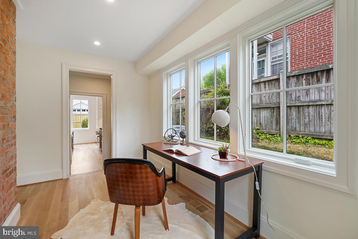 4339 Windom Place Northwest Washington, DC 20016 - Photo 11 of 45 a workspace with furniture and a window