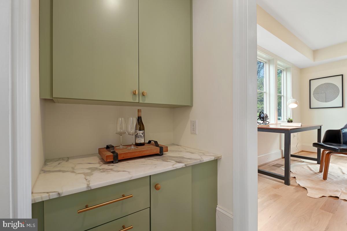 4339 Windom Place Northwest Washington, DC 20016 - Photo 12 of 45 a kitchen with a sink cabinets and a window