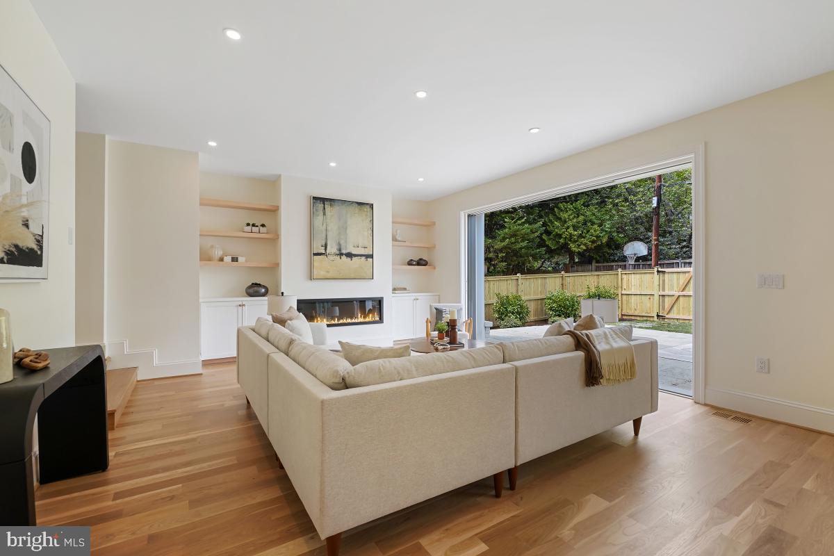 4339 Windom Place Northwest Washington, DC 20016 - Photo 19 of 45 a living room with furniture and a large window