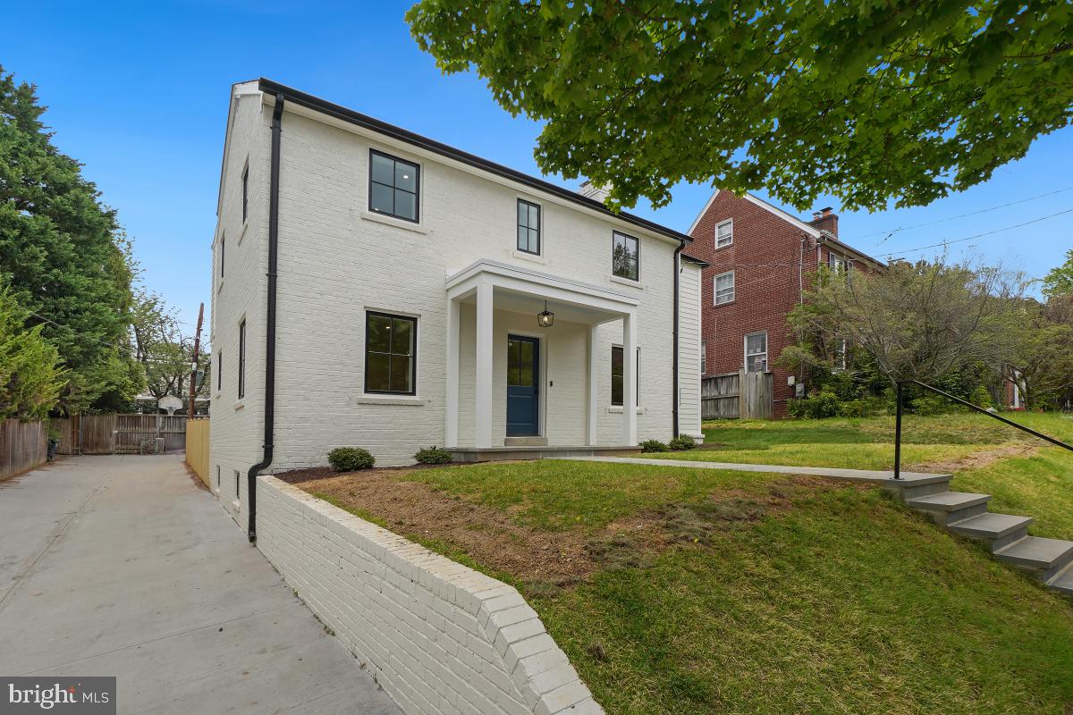 4339 Windom Place Northwest Washington, DC 20016 - Photo 2 of 45 a view of a house with a backyard