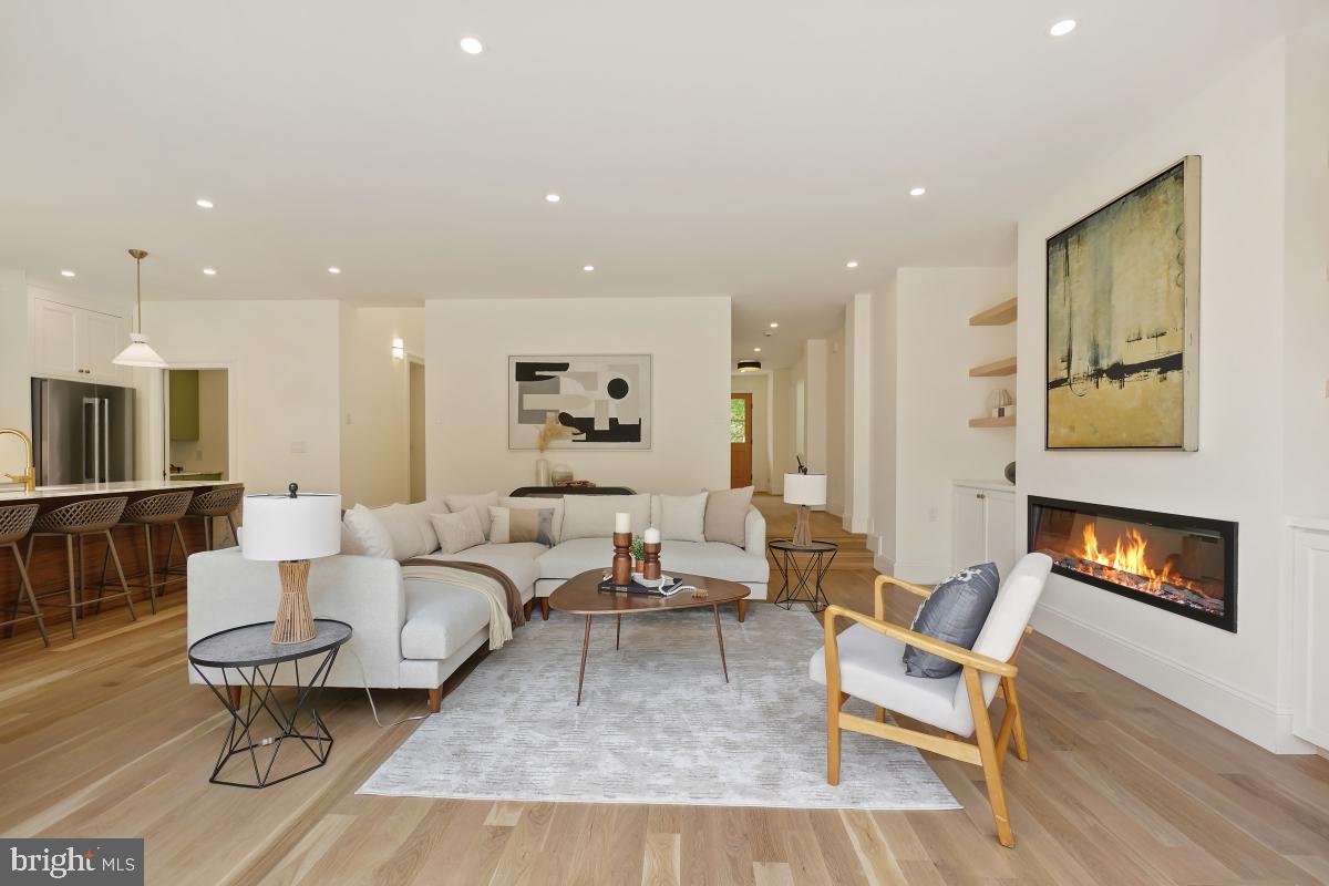 4339 Windom Place Northwest Washington, DC 20016 - Photo 22 of 45 a living room with furniture and a fireplace