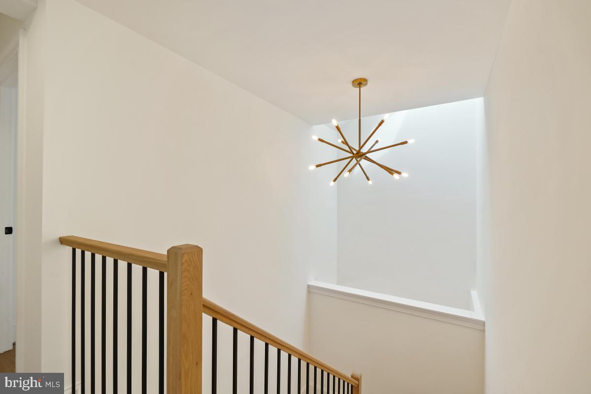 4339 Windom Place Northwest Washington, DC 20016 - Photo 25 of 45 a view of a hallway with a window
