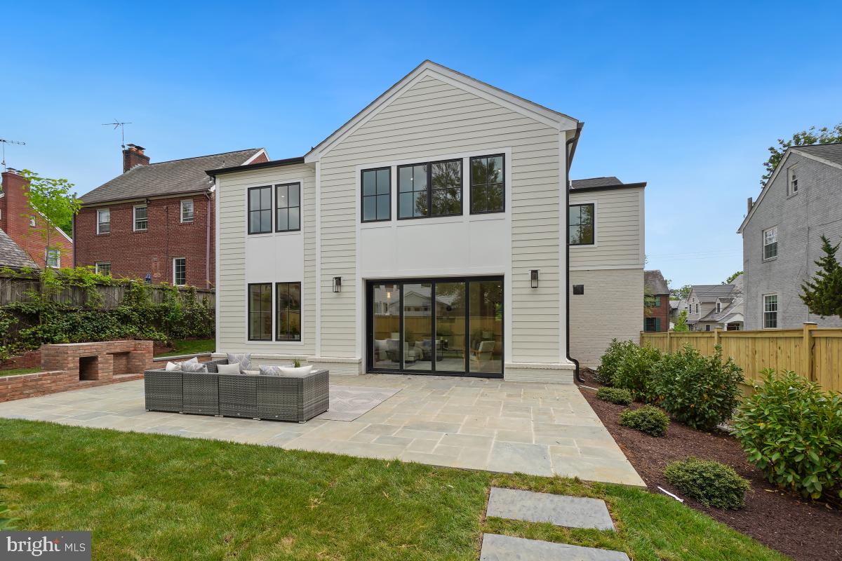 4339 Windom Place Northwest Washington, DC 20016 - Photo 43 of 45 a front view of a house with a yard
