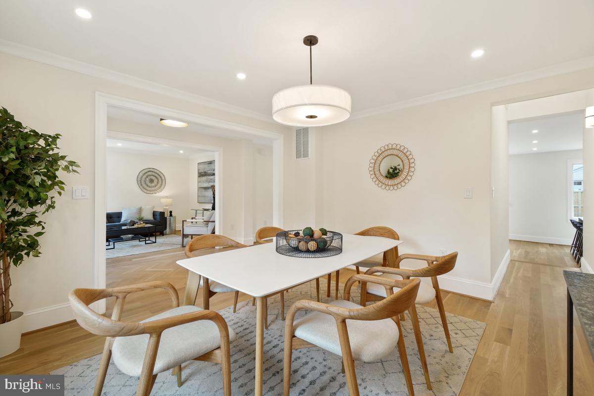 4339 Windom Place Northwest Washington, DC 20016 - Photo 9 of 45 a view of a dining room with furniture and wooden floor