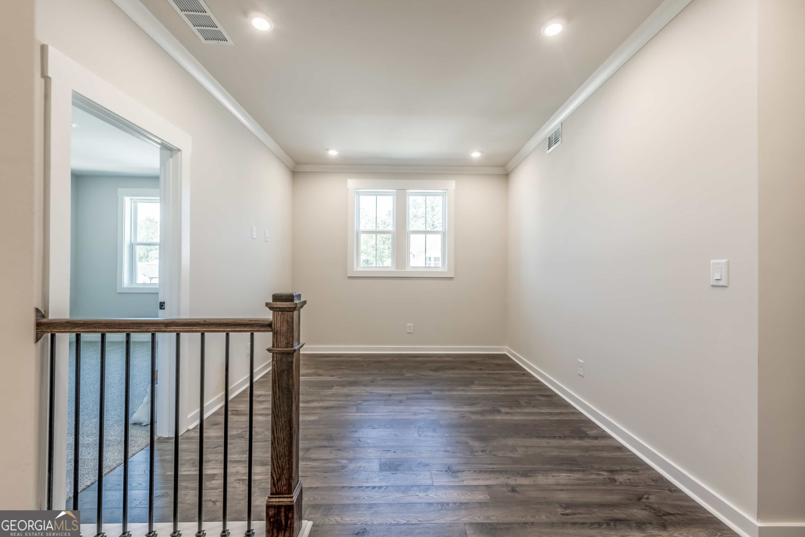 152 Henley Street, Unit 13 Canton, GA 30114 - Photo 14 of 37 a view of hallway with windows