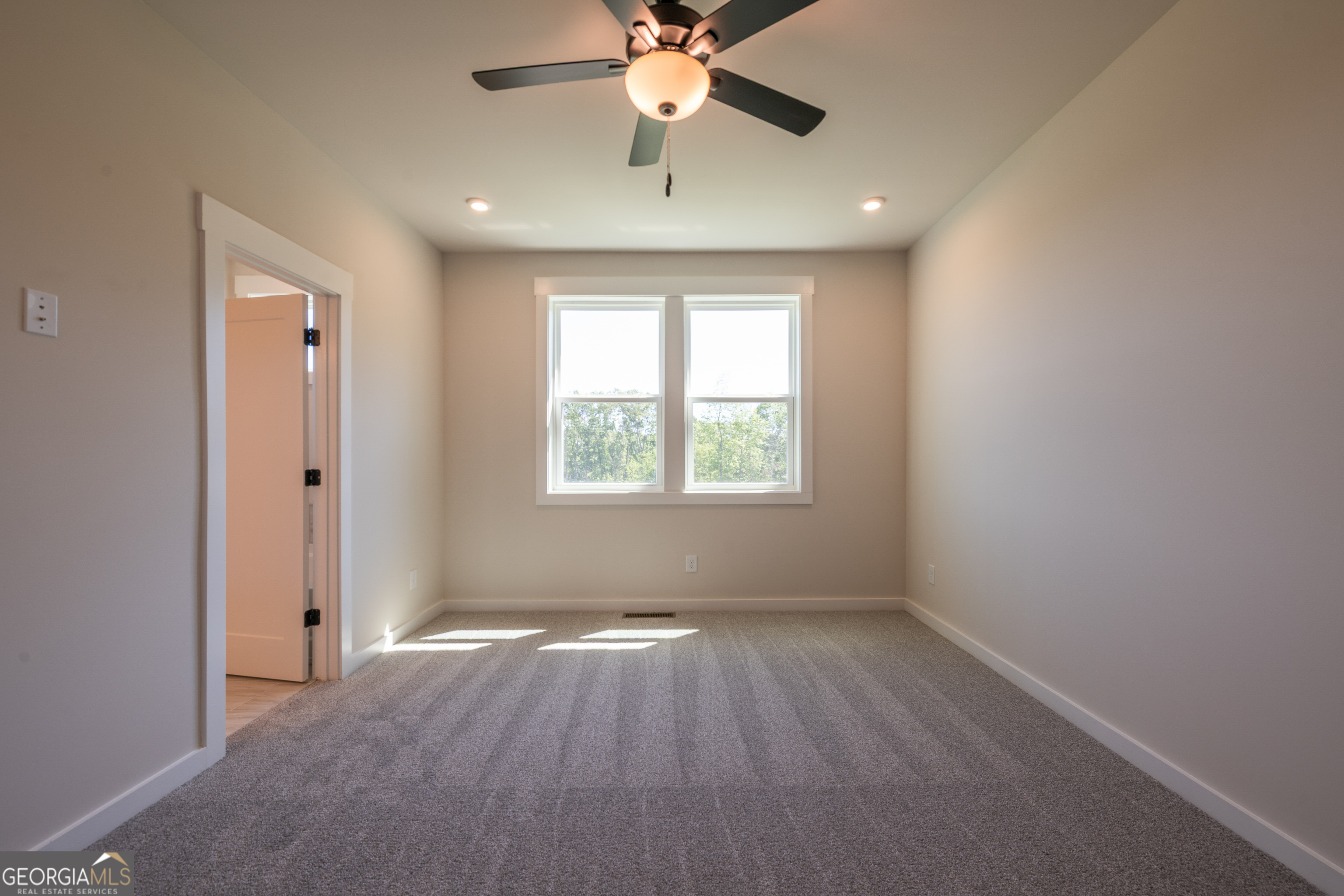 152 Henley Street, Unit 13 Canton, GA 30114 - Photo 15 of 37 wooden floor in an empty room with a window