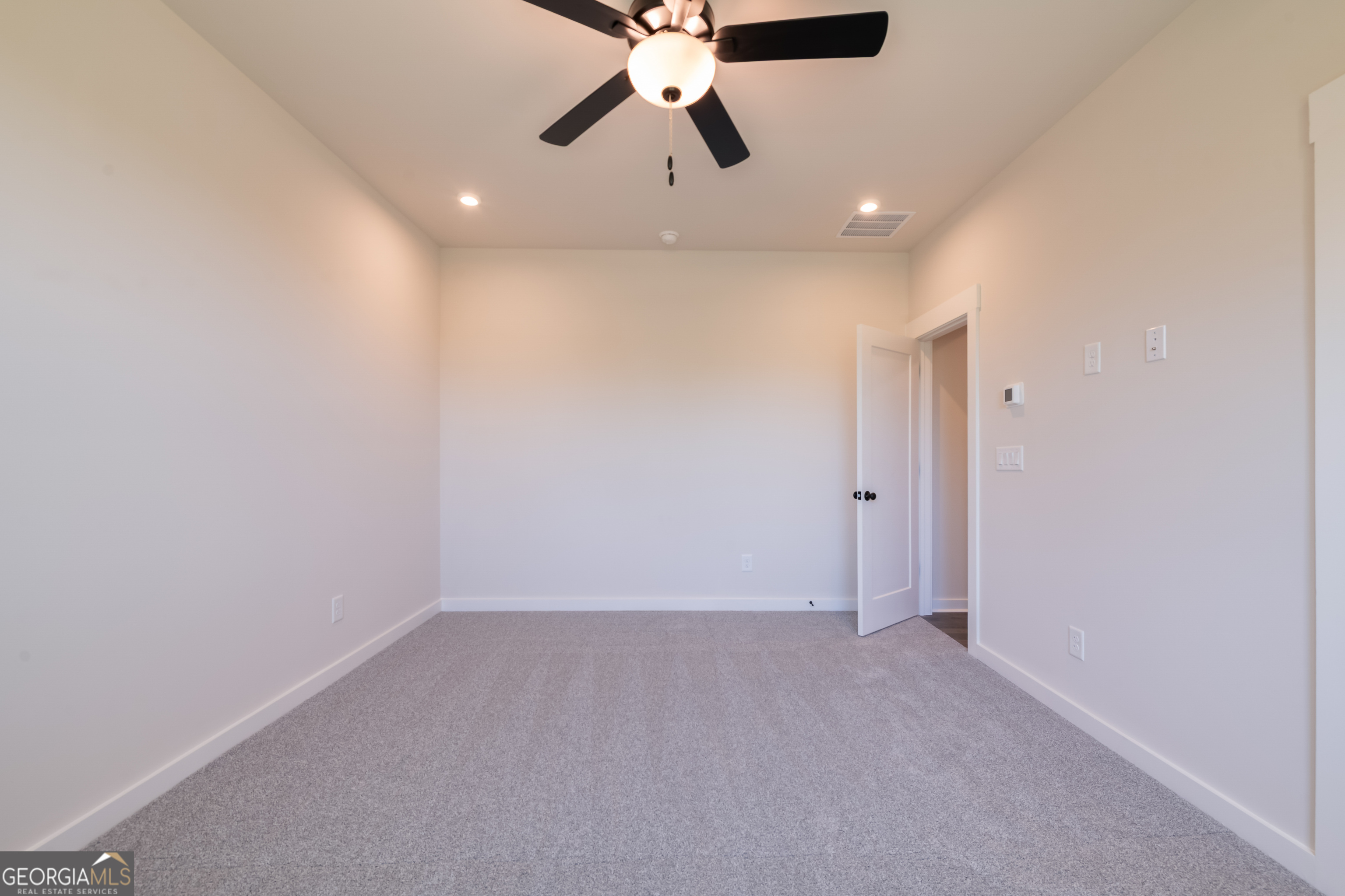 152 Henley Street, Unit 13 Canton, GA 30114 - Photo 16 of 37 a view of an empty room