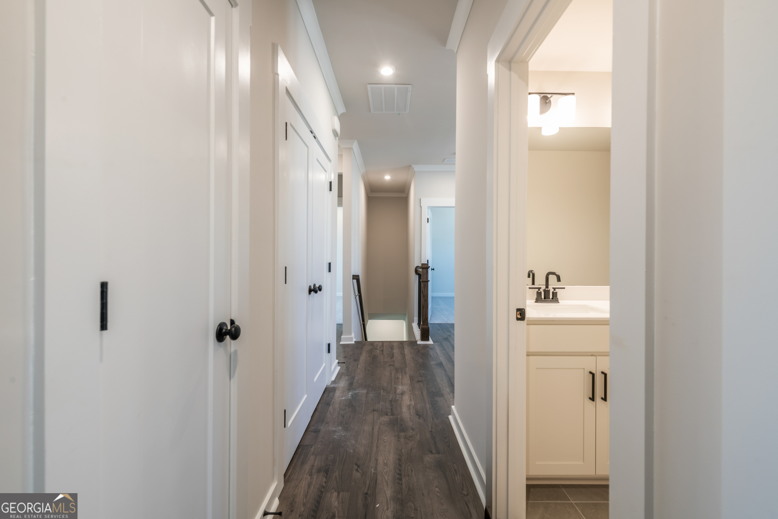 152 Henley Street, Unit 13 Canton, GA 30114 - Photo 23 of 37 a view of a hallway with a elevator