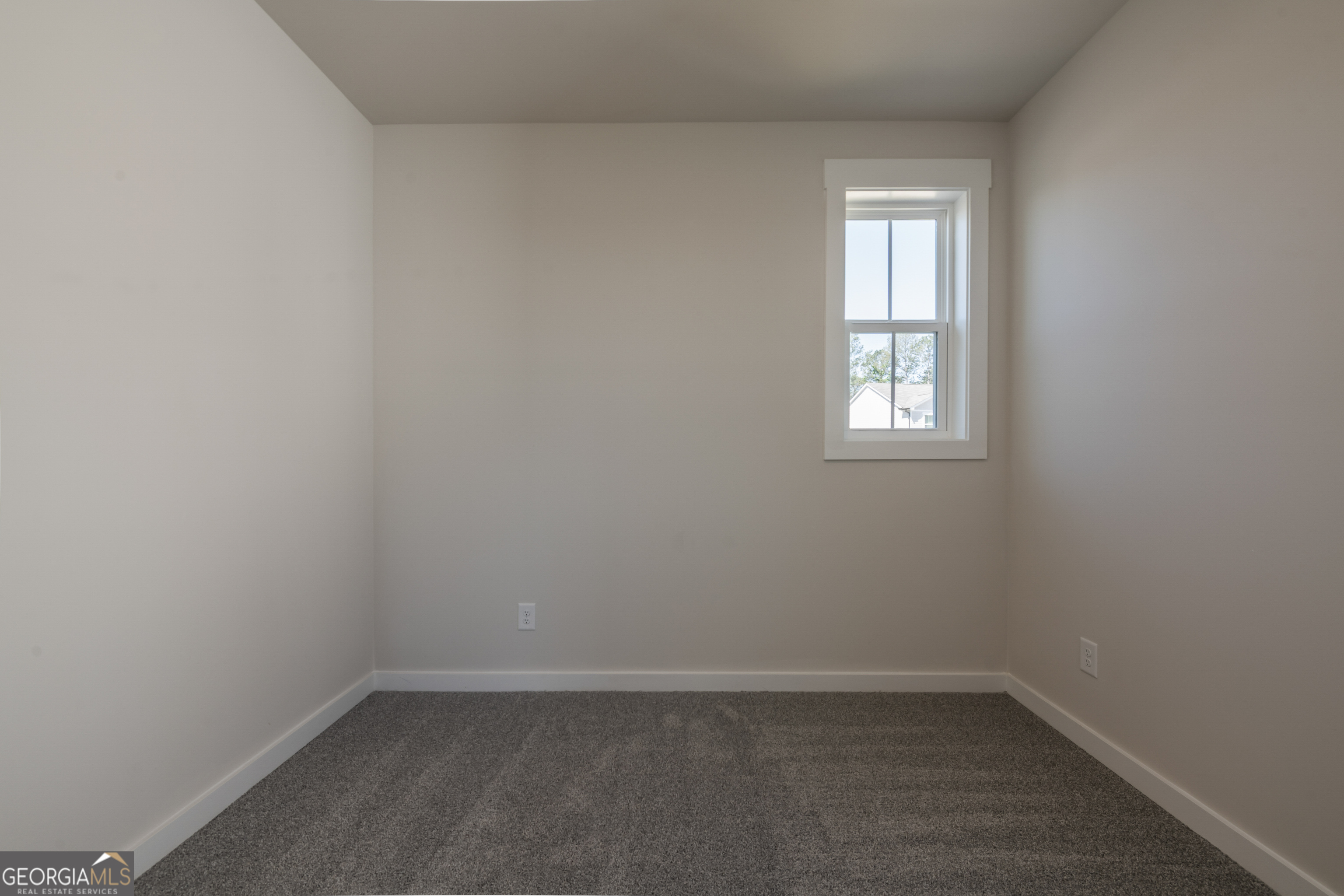 152 Henley Street, Unit 13 Canton, GA 30114 - Photo 24 of 37 an empty room with a window