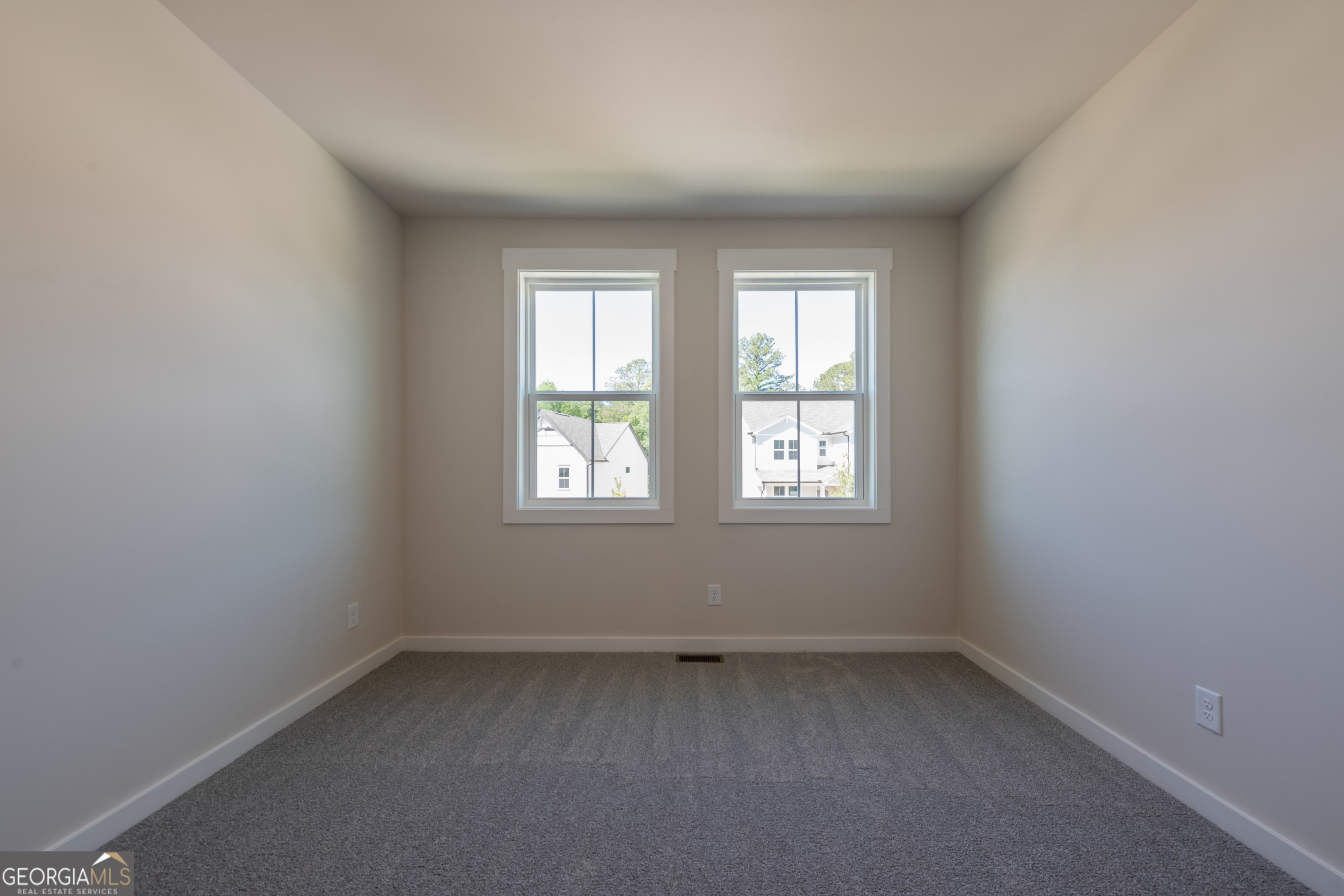 152 Henley Street, Unit 13 Canton, GA 30114 - Photo 30 of 37 an empty room with a window
