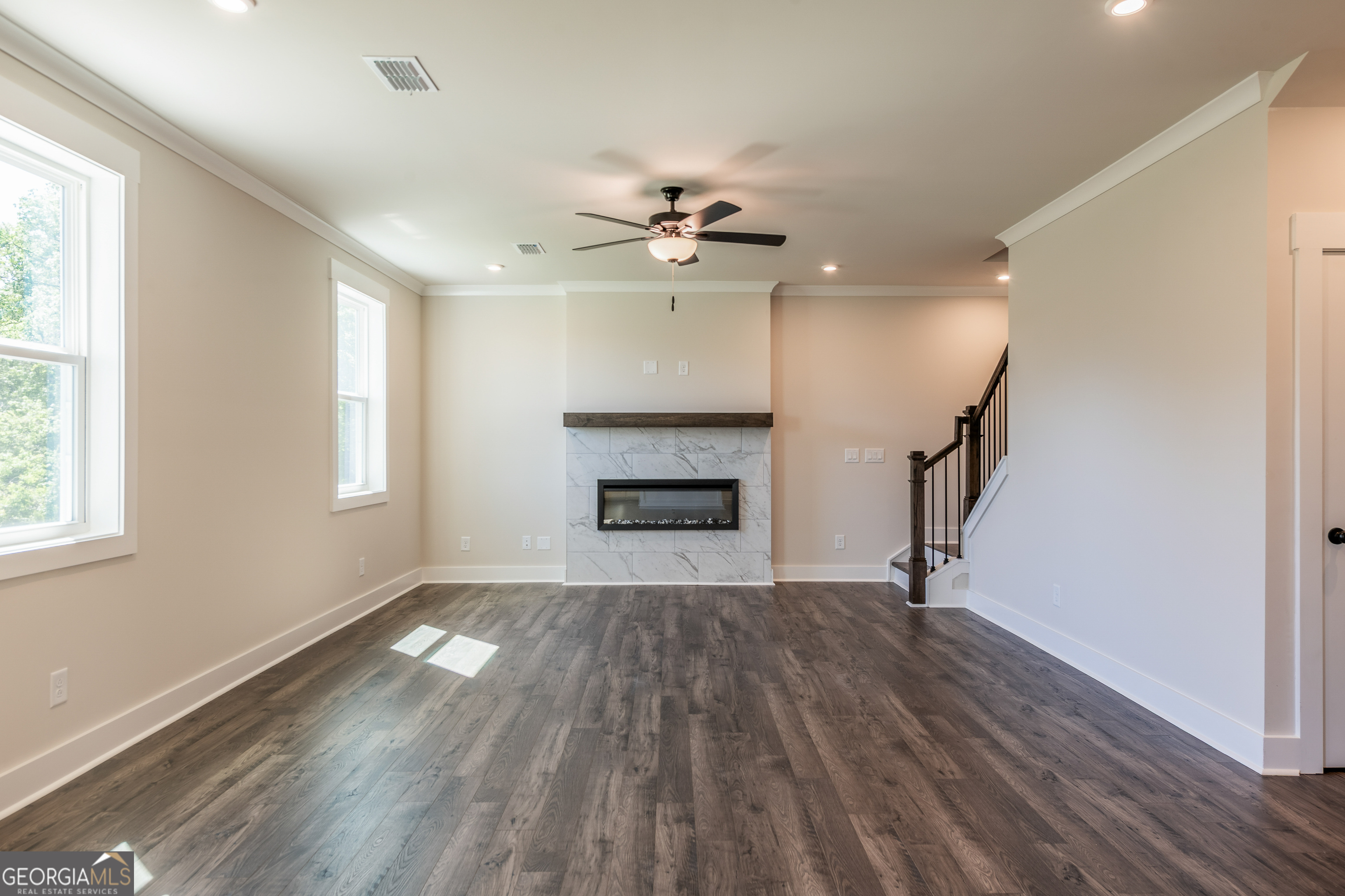 152 Henley Street, Unit 13 Canton, GA 30114 - Photo 4 of 37 wooden floor in an empty room with a window
