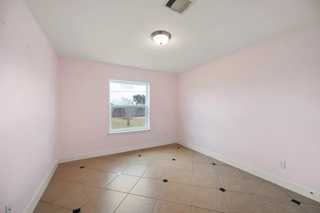 a view of a room with a window