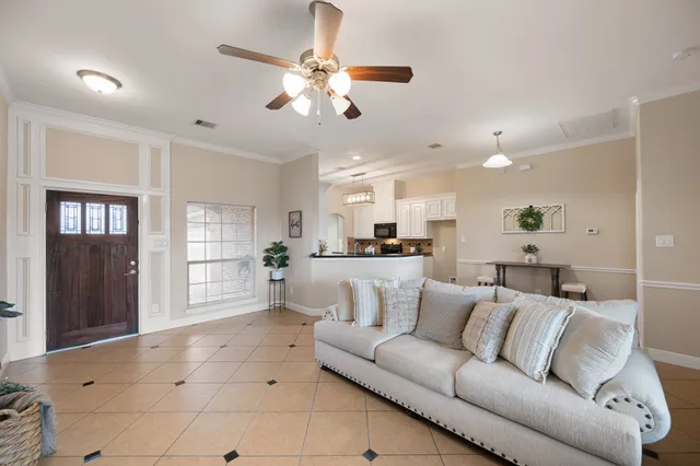 a view of kitchen with furniture and window