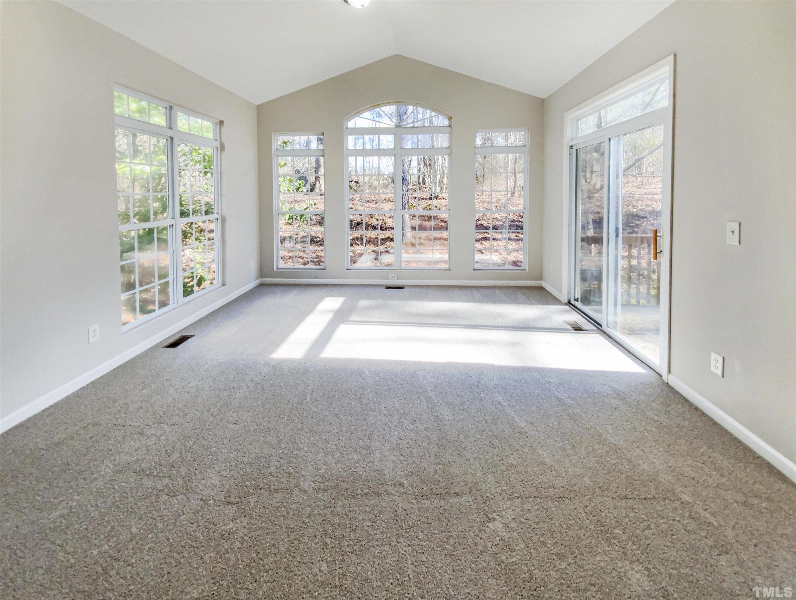 203 Caley Road Apex, NC 27502 - Photo 11 of 19 a view of an empty room with a window