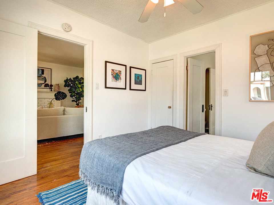 241 Ruth Avenue Venice, CA 90291 - Photo 14 of 25 a bedroom with a bed and a view of bathroom