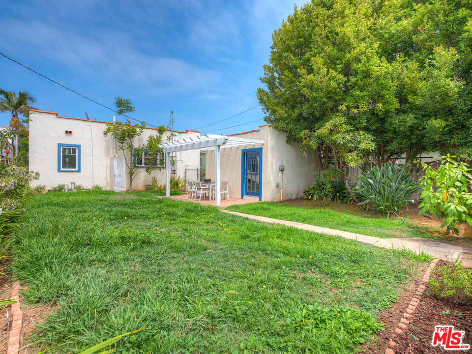 241 Ruth Avenue Venice, CA 90291 - Photo 20 of 25 a view of a house with backyard and a large tree