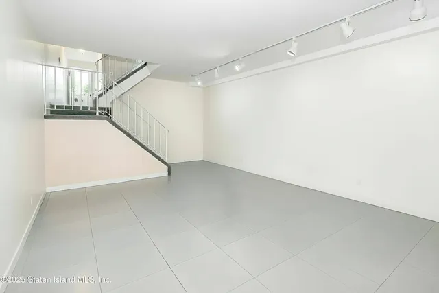 a view of a room with stairs