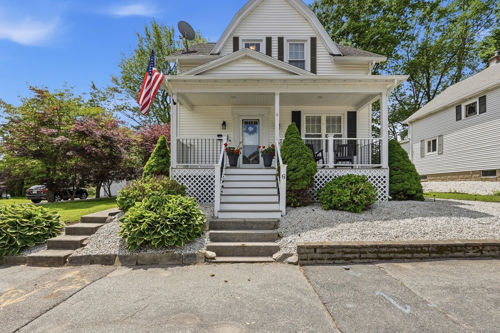 6 Anderson Avenue Worcester, MA 01604 - Photo 1 of 39 a front view of a house with a garden